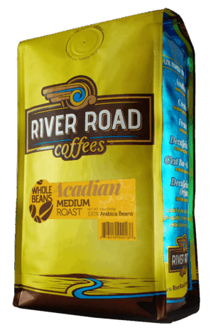 photo of bag of coffee in gold with yellow acadian whole bean coffee label